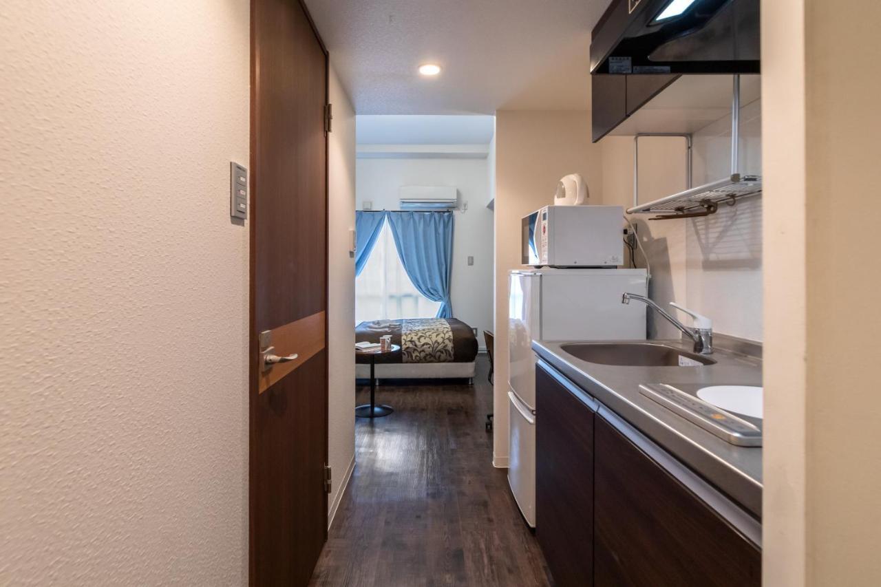 Mr Kinjo Eminence Inn Maejima Tomari Екстериор снимка